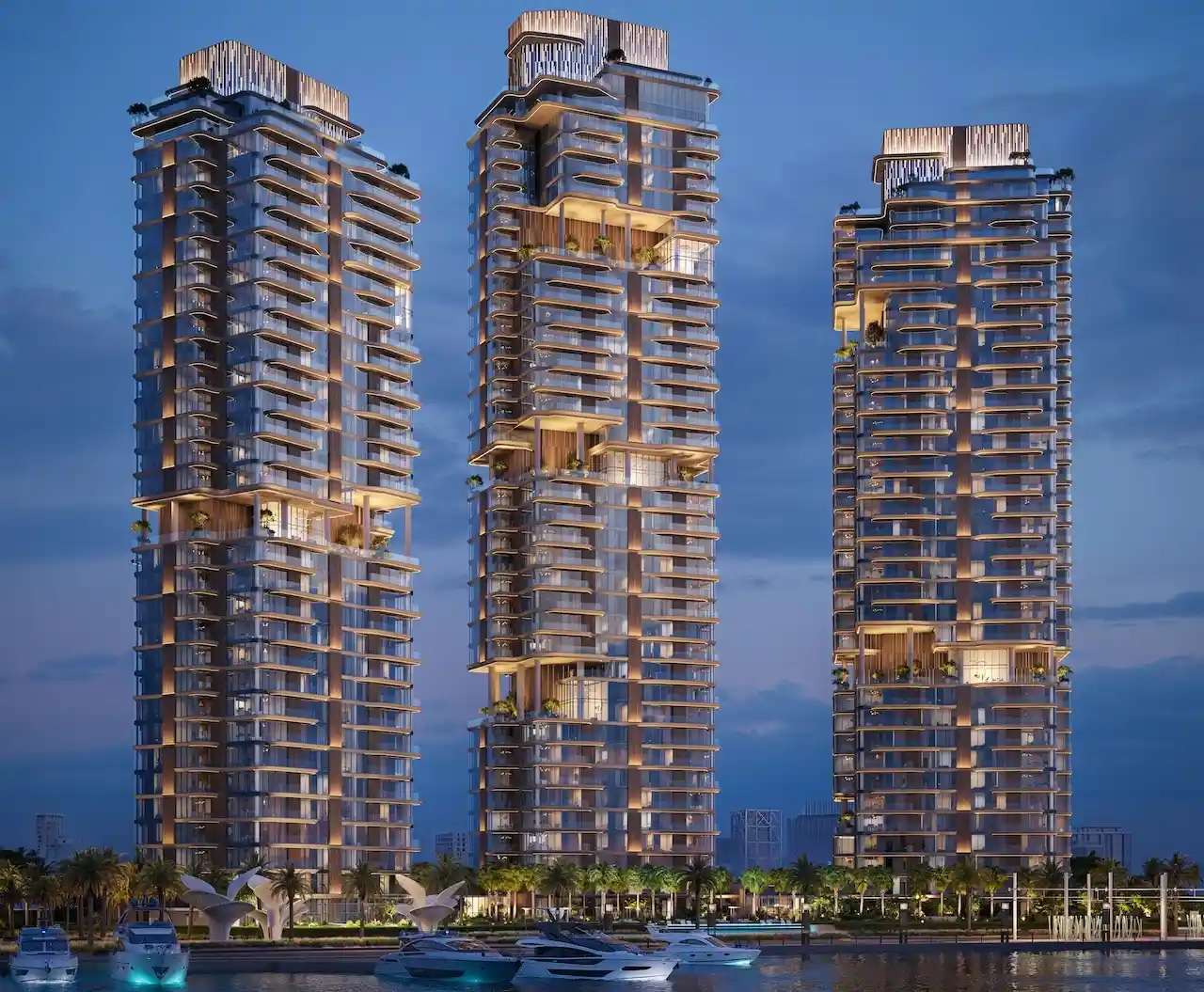 The Edit at d3 Construction Update December 2025 showing modern residential towers with illuminated balconies and waterfront setting in Dubai Presented by Tohid Fetrat