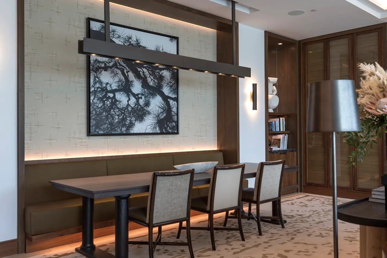 The Lana Residences Dorchester Collection by Omniyat 2 bedroom dining area with modern seating and warm ambient lighting in Dubai - Presented by Tohid Fetrat