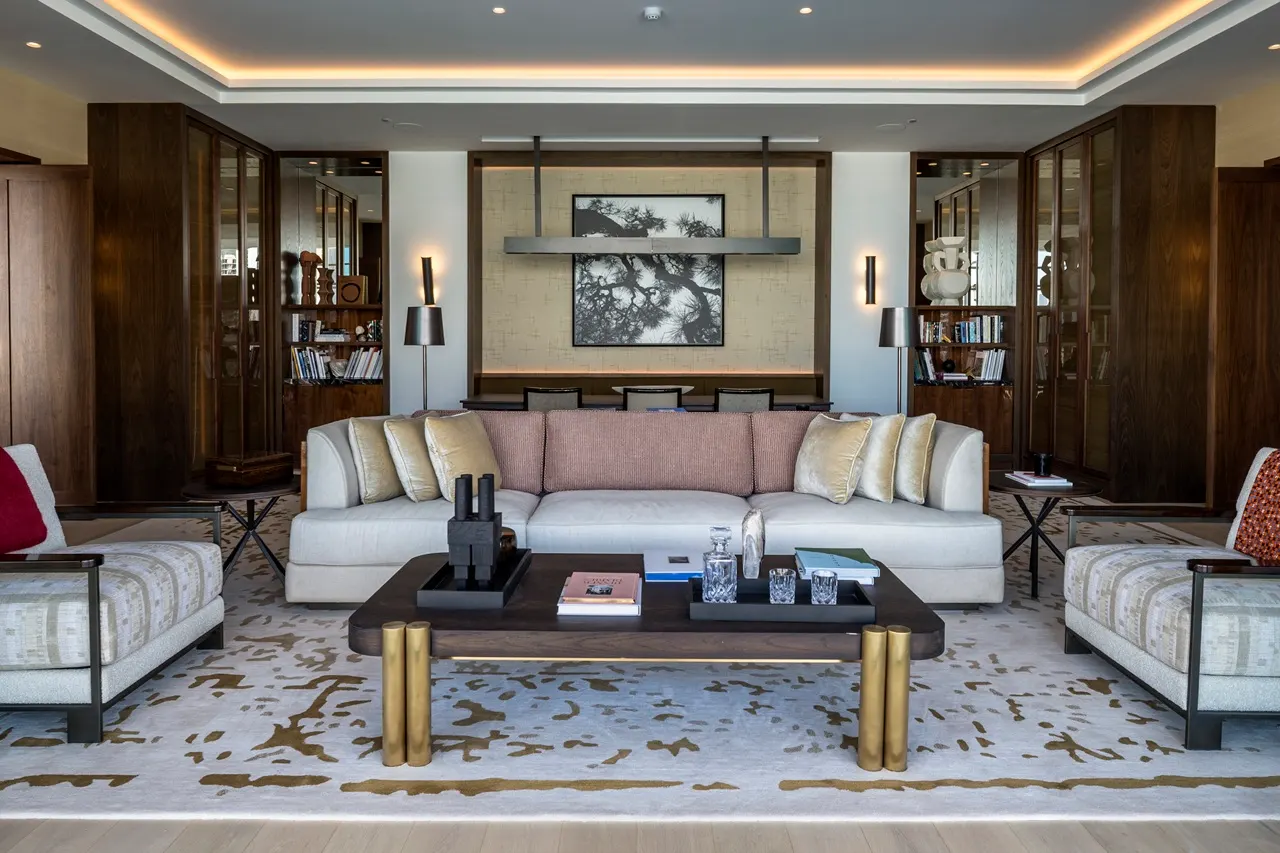 The Lana Residences Dorchester Collection by Omniyat 2 bedroom living room with elegant seating and refined interior design in Dubai - Presented by Tohid Fetrat
