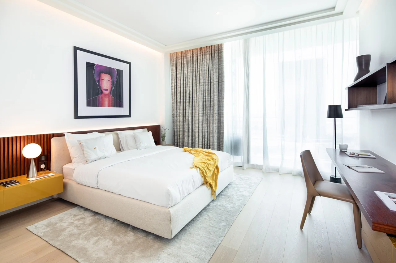 The Lana Residences Dorchester Collection by Omniyat 4 bedroom duplex bedroom with floor to ceiling windows natural light modern design and workspace area in Dubai - Presented by Tohid Fetrat