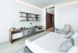 The Lana Residences Dorchester Collection by Omniyat 4 bedroom duplex bedroom with integrated home office workspace modern design and minimalist interior in Dubai - Presented by Tohid Fetrat