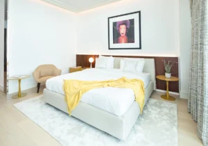 The Lana Residences Dorchester Collection by Omniyat 4 bedroom duplex bedroom with modern interior soft tones elegant furniture and premium finishes in Dubai - Presented by Tohid Fetrat