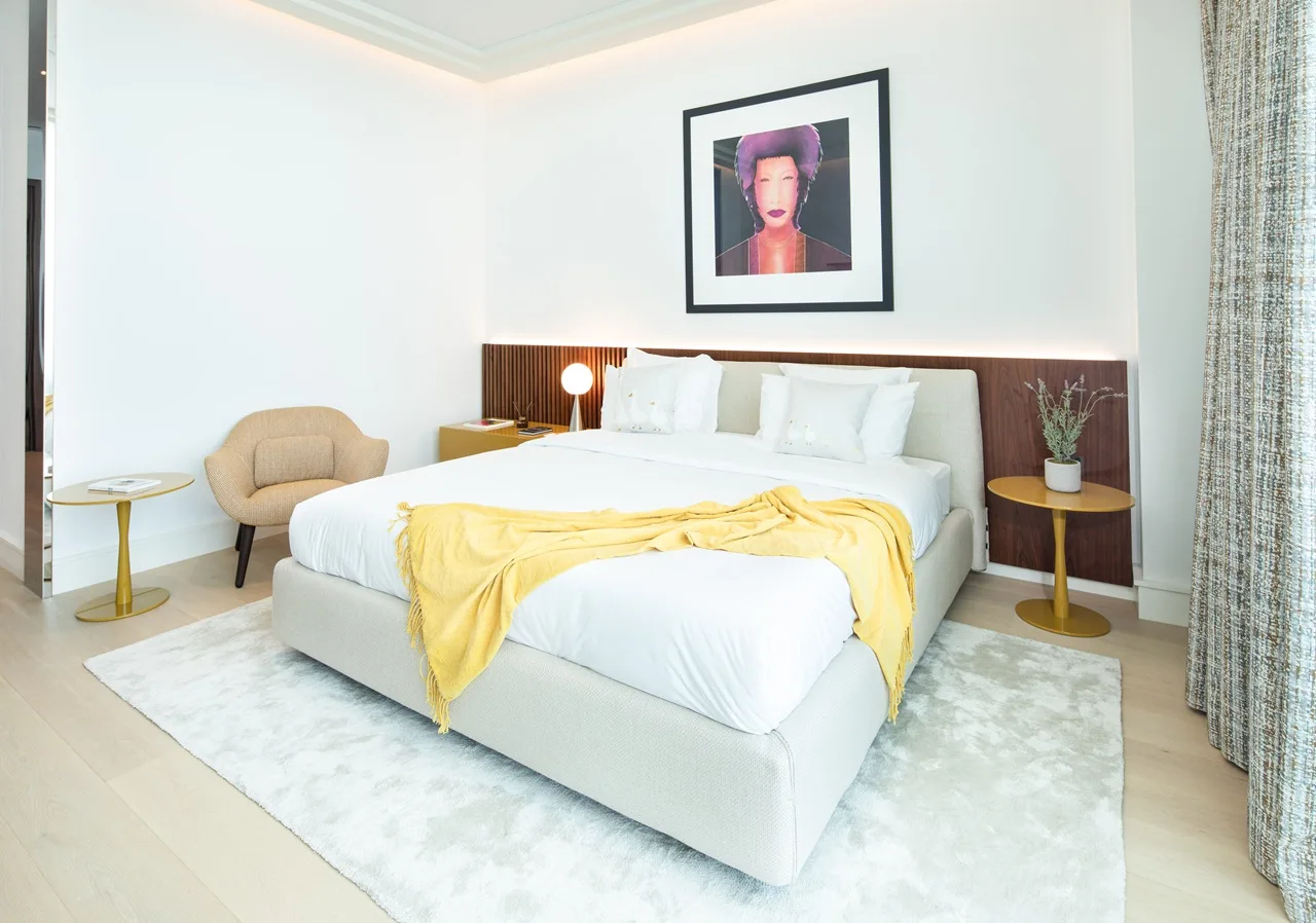 The Lana Residences Dorchester Collection by Omniyat 4 bedroom duplex bedroom with modern interior soft tones elegant furniture and premium finishes in Dubai - Presented by Tohid Fetrat