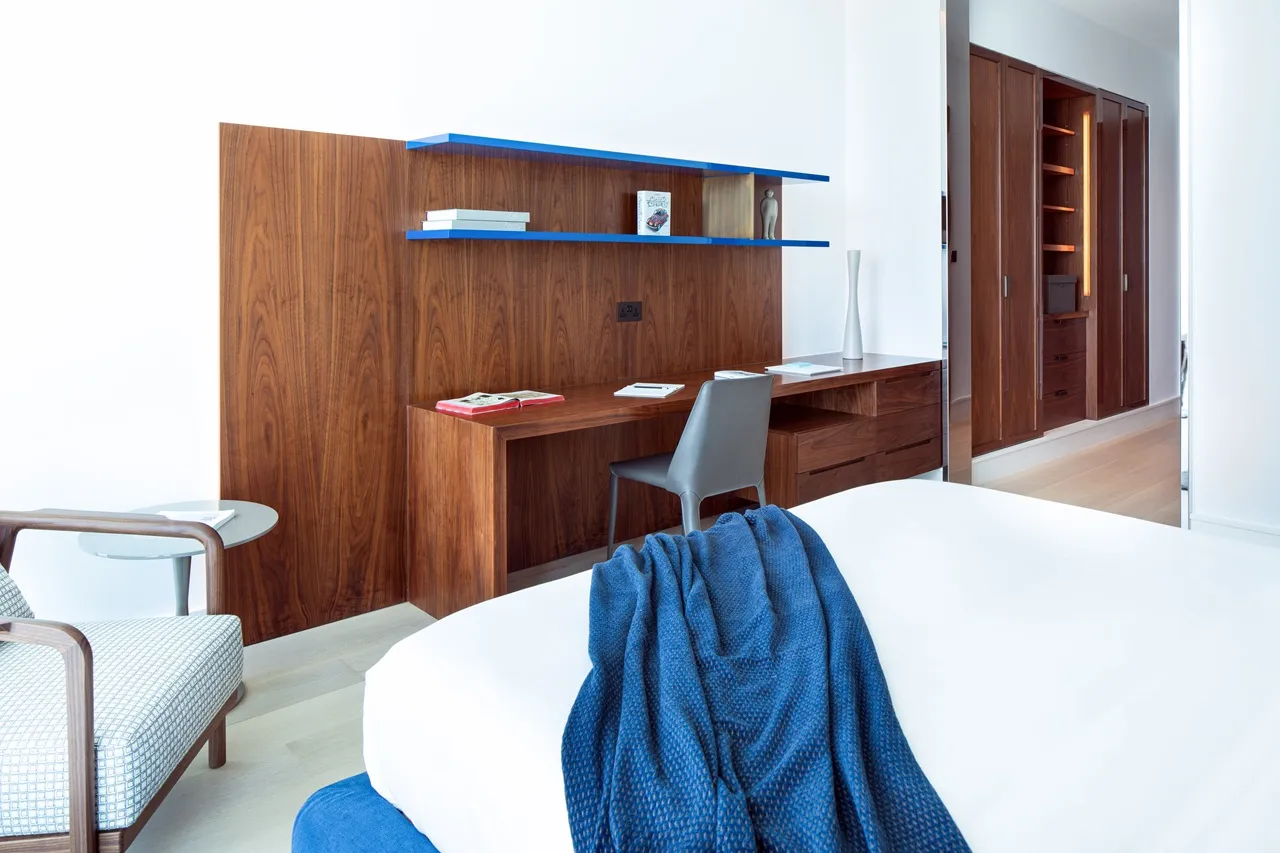 The Lana Residences Dorchester Collection by Omniyat 4 bedroom duplex bedroom with integrated study area wooden finishes and modern design in Dubai - Presented by Tohid Fetrat