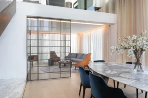 The Lana Residences Dorchester Collection by Omniyat 4 bedroom duplex with dining area and partitioned living space in Dubai - Presented by Tohid Fetrat