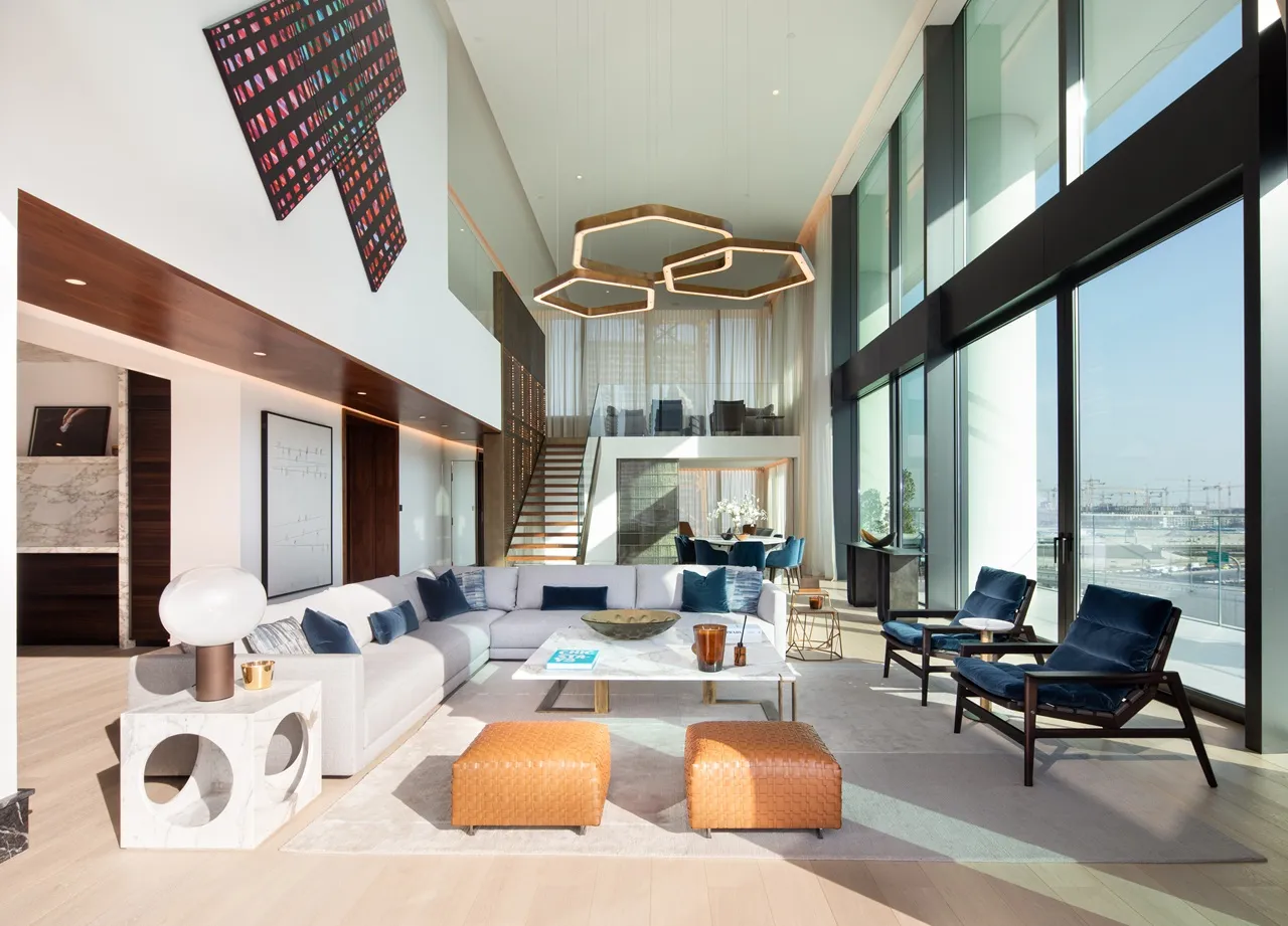 The Lana Residences Dorchester Collection by Omniyat 4 bedroom duplex double height living area with mezzanine level and floor to ceiling windows in Dubai - Presented by Tohid Fetrat