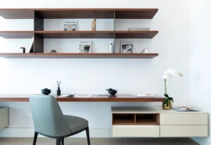 The Lana Residences Dorchester Collection by Omniyat 4 bedroom duplex home office with floating desk wood shelving and minimalist styling in Dubai - Presented by Tohid Fetrat