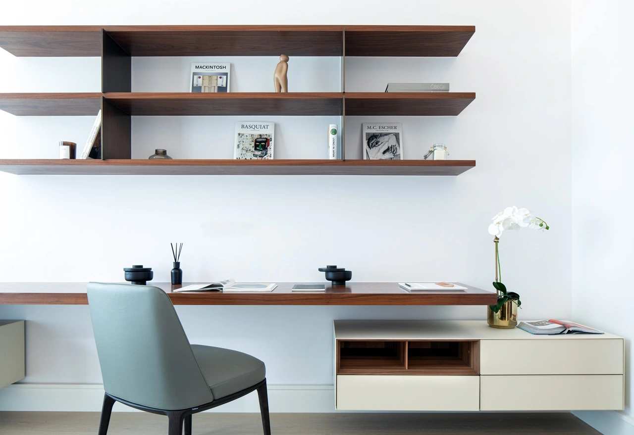 The Lana Residences Dorchester Collection by Omniyat 4 bedroom duplex home office with floating desk wood shelving and minimalist styling in Dubai - Presented by Tohid Fetrat