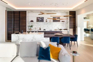 The Lana Residences Dorchester Collection by Omniyat 4 bedroom duplex marble kitchen island with open plan dining area and modern interior in Dubai - Presented by Tohid Fetrat