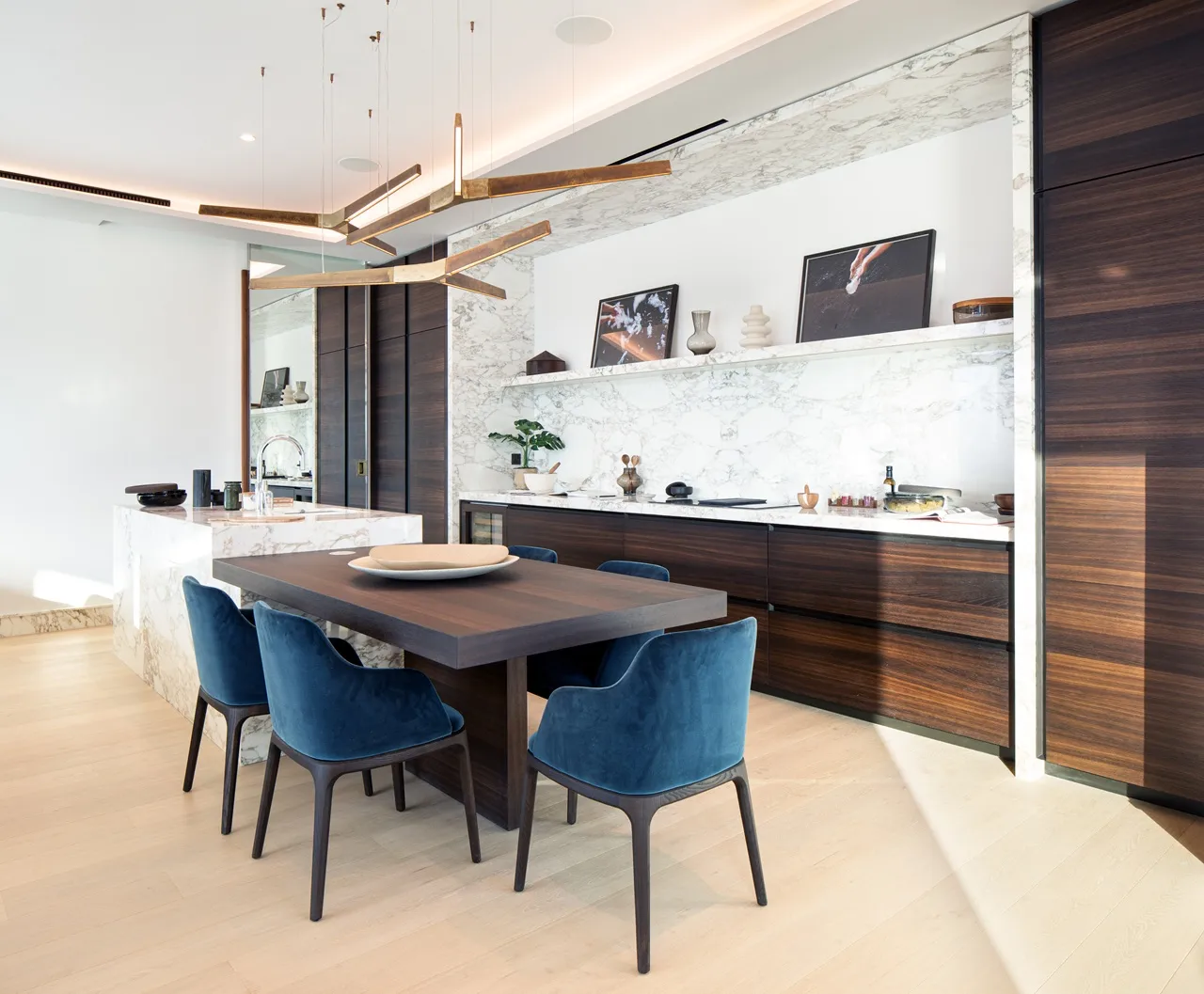 The Lana Residences Dorchester Collection by Omniyat 4 bedroom duplex modern dining area with marble kitchen and elegant finishes in Dubai - Presented by Tohid Fetrat