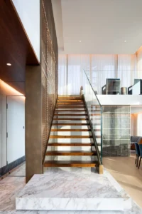 The Lana Residences Dorchester Collection by Omniyat 4 bedroom duplex with modern staircase and marble base interior in Dubai - Presented by Tohid Fetrat