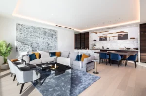 The Lana Residences Dorchester Collection by Omniyat 4 bedroom duplex spacious living and dining area with open layout and modern interior design in Dubai - Presented by Tohid Fetrat