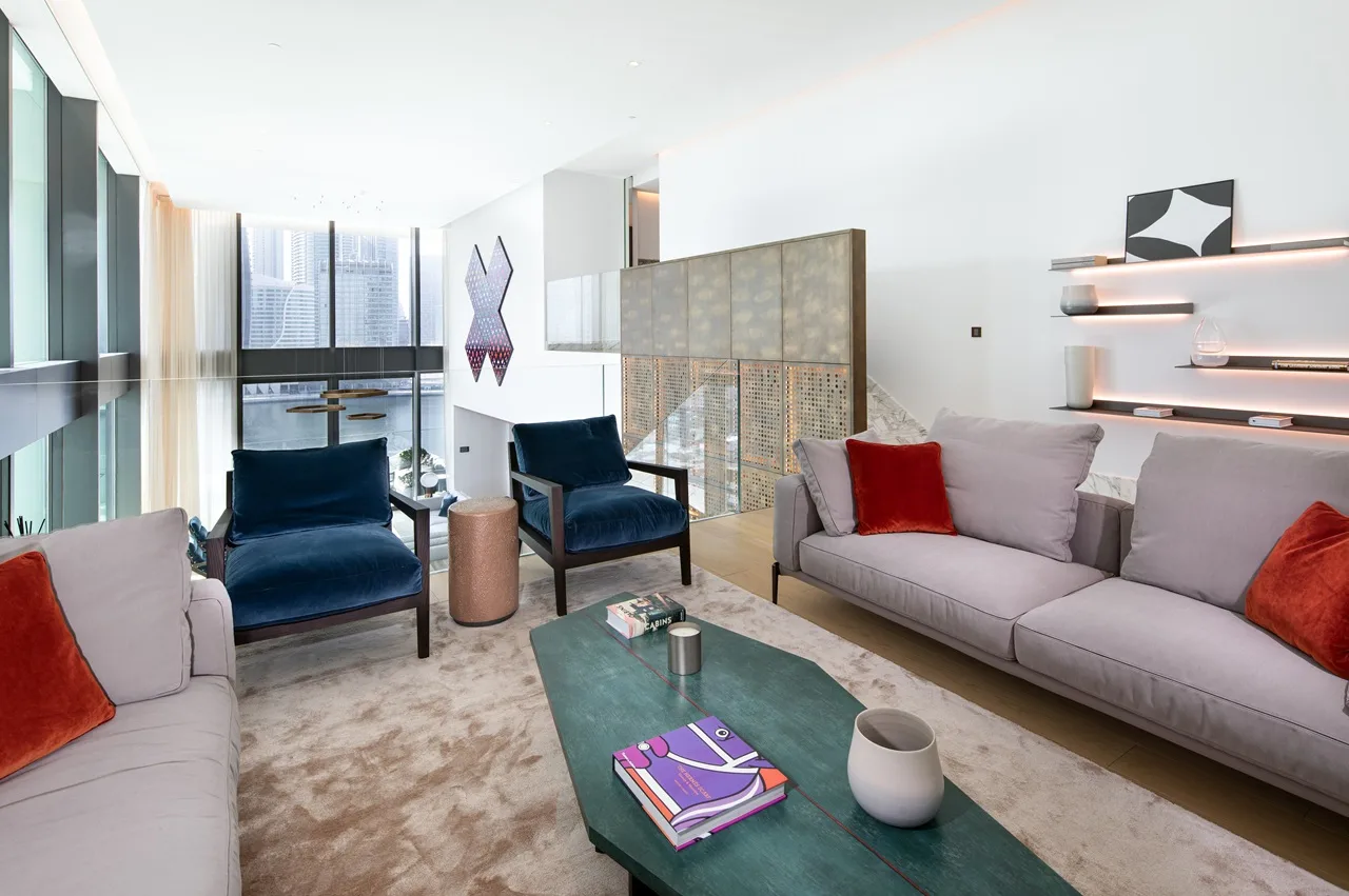 The Lana Residences Dorchester Collection by Omniyat 4 bedroom duplex upper lounge seating area with double height view in Dubai - Presented by Tohid Fetrat