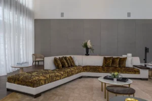 The Lana Residences Dorchester Collection by Omniyat 4 bedroom lounge living area with sectional sofa soft tones and natural light in Dubai - Presented by Tohid Fetrat