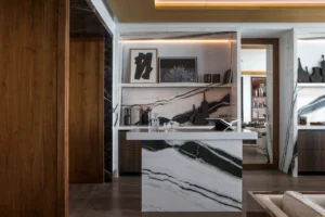 The Lana Residences Dorchester Collection by Omniyat 4 bedroom kitchen with marble island feature wall and refined interior styling in Dubai - Presented by Tohid Fetrat