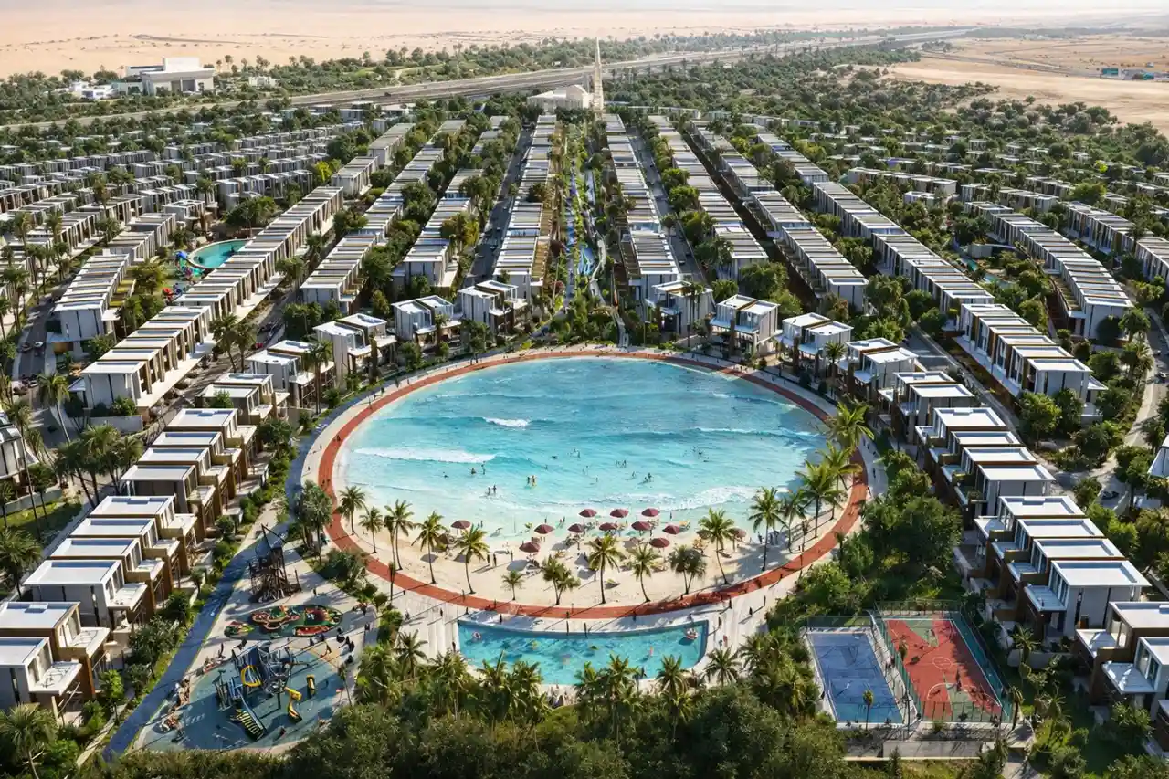 Tilal Binghatti Phase 1 construction update showing master community layout with central lagoon, villas, landscaped walkways, and amenities in Dubai Presented by Tohid Fetrat