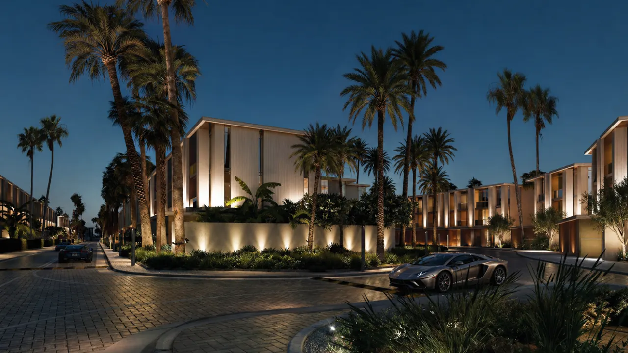 Tilal Binghatti Townhouses and Villas for Sale featuring modern residences with palm lined streets and luxury cars at night in Dubai Presented by Tohid Fetrat