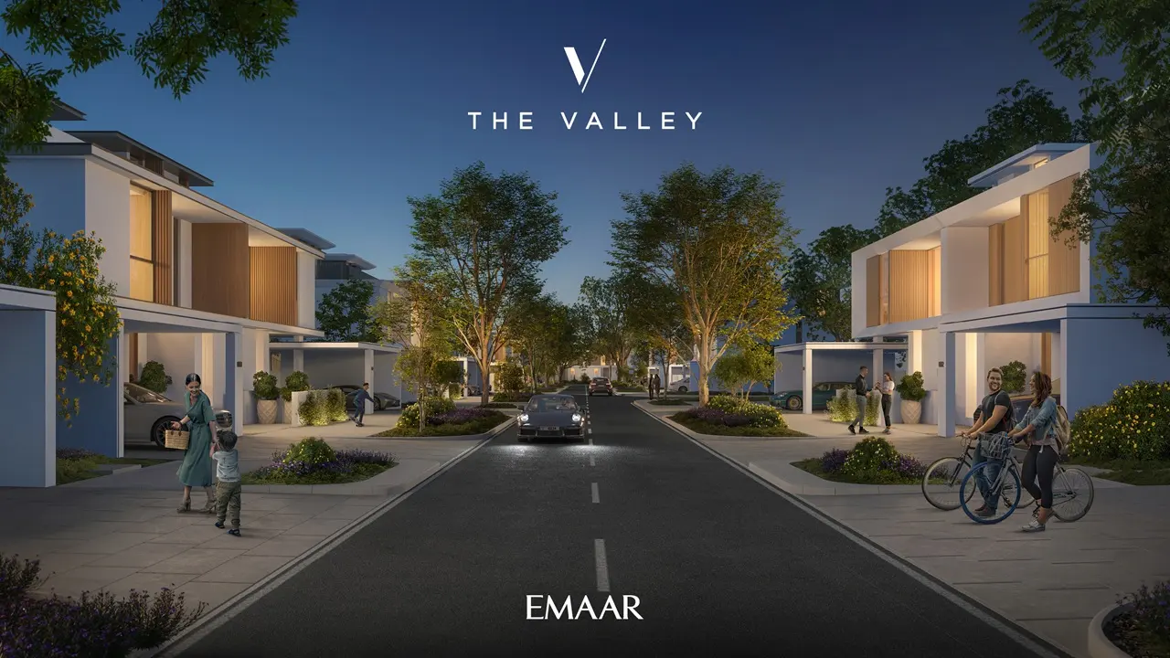 Velora The Valley by Emaar nighttime community street with modern villas and landscaped sidewalks in Dubai - Presented by Tohid Fetrat