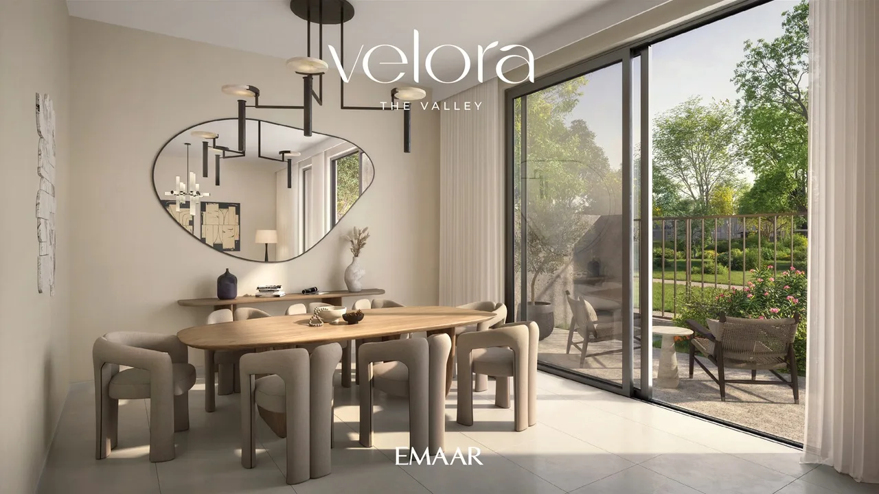 Velora The Valley by Emaar modern dining room interior with garden facing sliding doors in Dubai - Presented by Tohid Fetrat