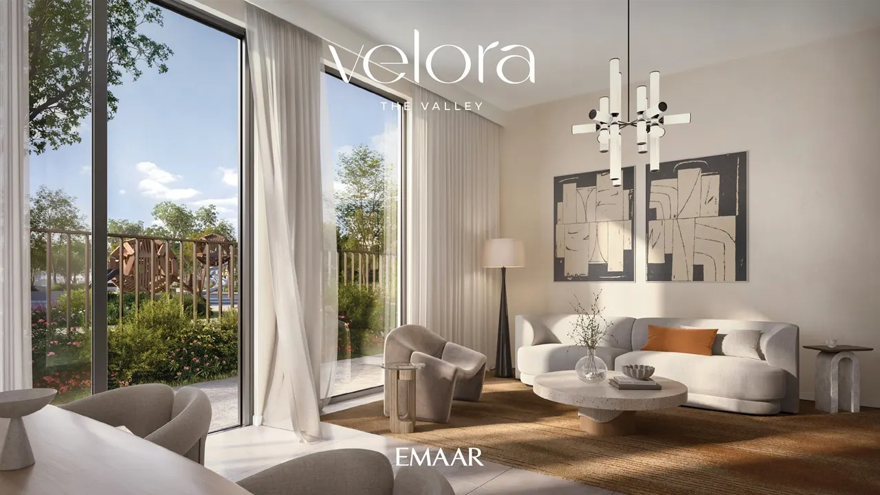 Velora The Valley by Emaar modern living room interior with large windows natural light and garden view in Dubai - Presented by Tohid Fetrat