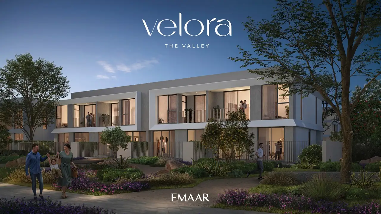 Velora The Valley by Emaar townhouse evening exterior with illuminated interiors and landscaped walkways in Dubai - Presented by Tohid Fetrat