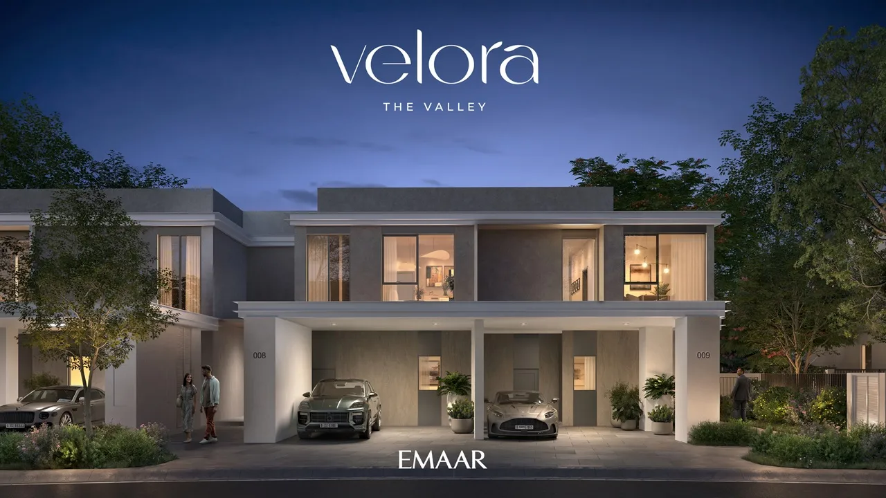 Velora The Valley by Emaar modern villa night front exterior with illuminated interiors and covered parking in Dubai - Presented by Tohid Fetrat