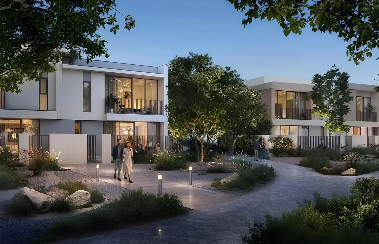 Vindera at The Valley by Emaar villa community walkway with landscaped gardens and evening lighting in Dubai - Presented by Tohid Fetrat