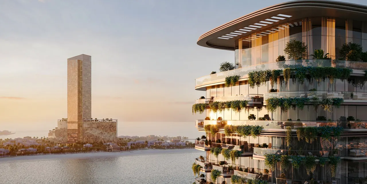 Beyond Developments Properties for Sale in Dubai featuring luxury waterfront residences with curved architecture and landscaped terraces at sunset Presented by Tohid Fetrat