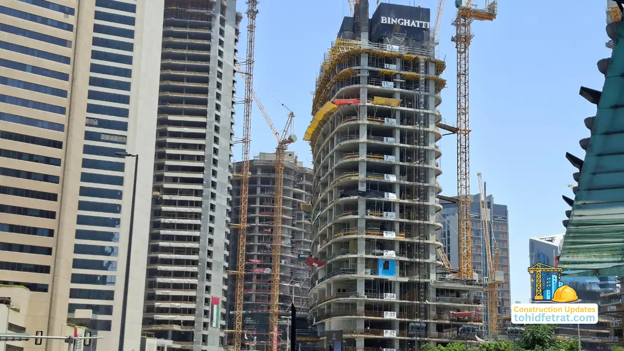 Active Binghatti tower construction site with cranes and high rise structural progress during Binghatti Construction Updates in Dubai Presented by Tohid Fetrat