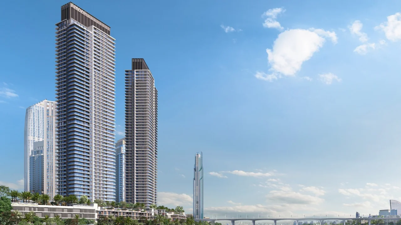 Creek Waters 2 at Dubai Creek Harbour by Emaar residential towers exterior with clear sky skyline view in Dubai - Presented by Tohid Fetrat