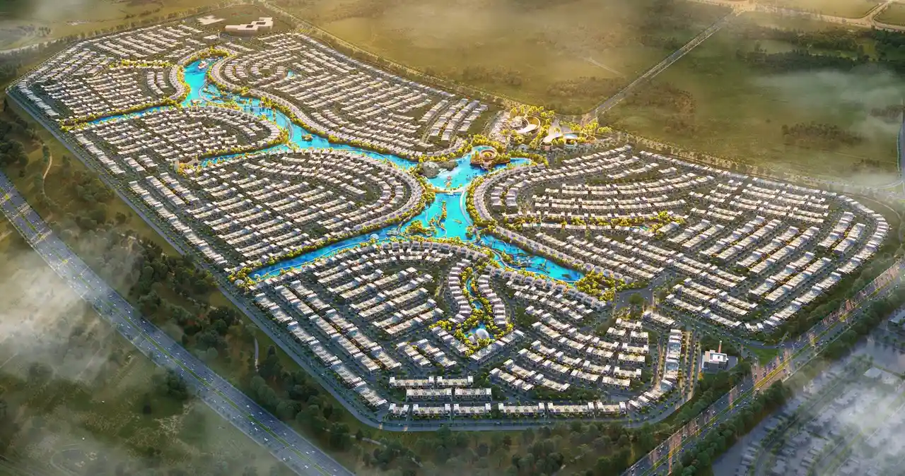 DAMAC Islands 2 masterplan featuring lagoon centered community layout with villas clusters and waterways aerial view in Dubai Presented by Tohid Fetrat