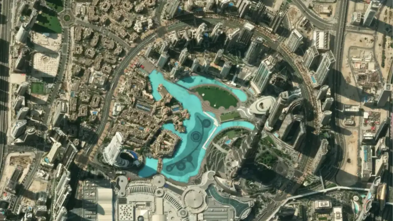 Downtown Dubai Masterplan aerial view showing Burj Lake district layout with surrounding towers and urban grid in Dubai Presented by Tohid Fetrat