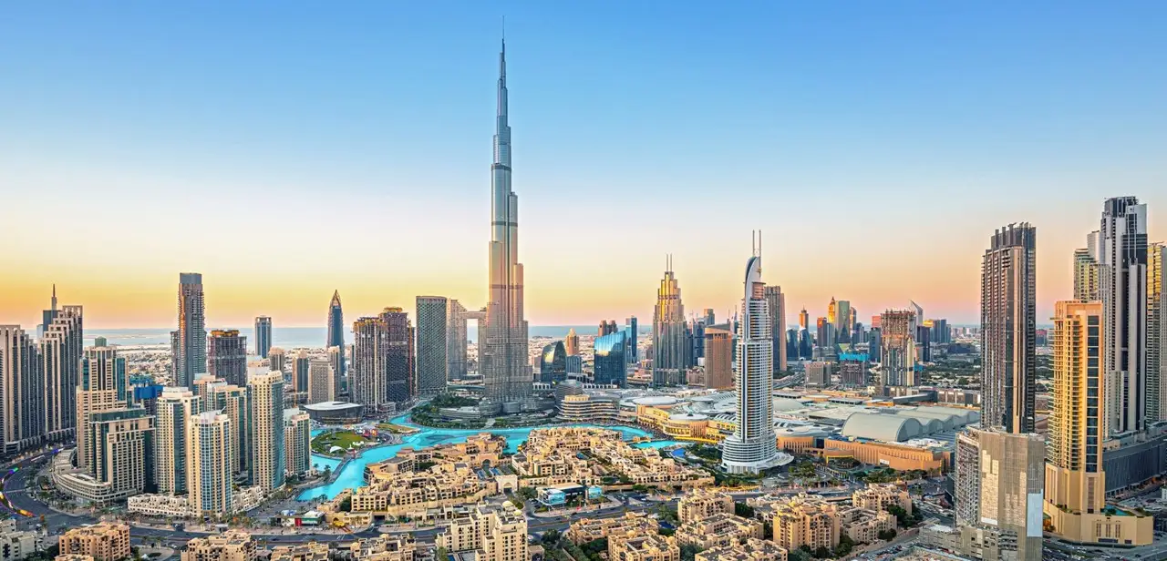 Downtown Dubai Properties for Sale featuring Burj Khalifa, Dubai Mall, Dubai Fountain and the iconic skyline of central Dubai. Presented by Tohid Fetrat