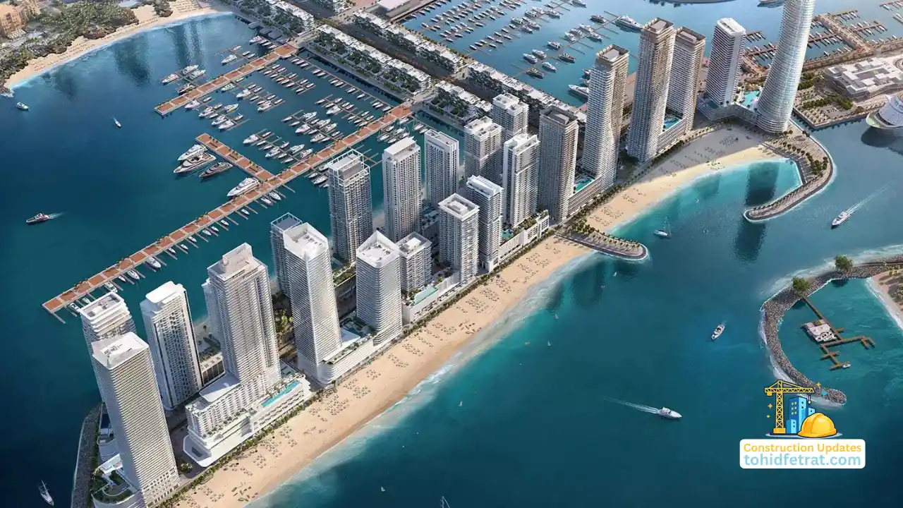 Aerial beachfront and marina view of luxury waterfront towers during Emaar Beachfront Construction Updates in Dubai Presented by Tohid Fetrat