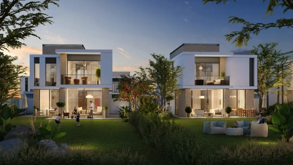 Fairway Villas at Emaar South by Emaar luxury villa exteriors with landscaped gardens outdoor lounges and illuminated evening ambiance in Dubai - Presented by Tohid Fetrat
