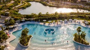 GEMS Estates by DAMAC at DAMAC Hills lagoon style swimming pool and resort amenities in Dubai - Presented by Tohid Fetrat