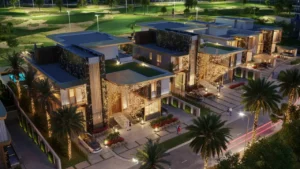 GEMS Estates by DAMAC at DAMAC Hills luxury villa community night view with illuminated modern architecture in Dubai - Presented by Tohid Fetrat