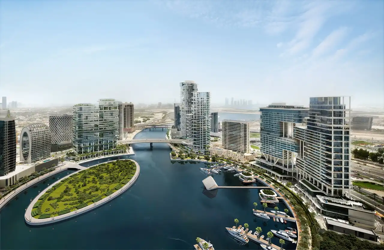 Marasi Bay waterfront towers and canal side development in Dubai showing ongoing construction progress Presented by Tohid Fetrat