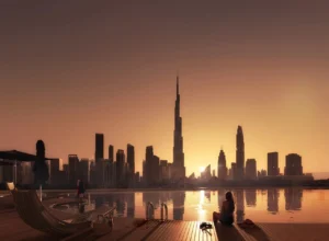 Mercedes-Benz Places by Binghatti infinity pool overlooking the Downtown Dubai skyline and Burj Khalifa at sunset in Dubai - Presented by Tohid Fetrat