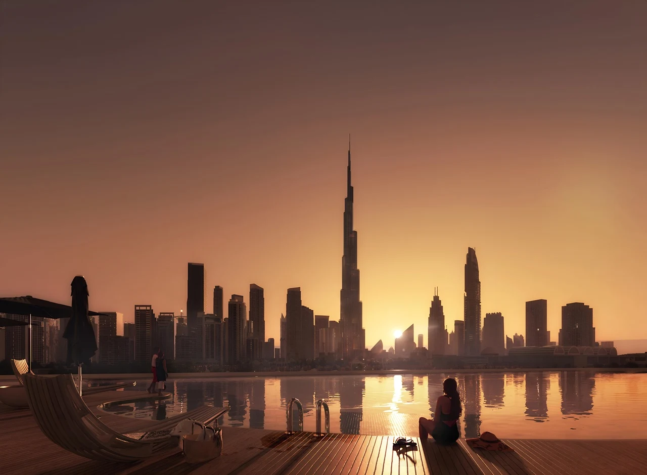Mercedes-Benz Places by Binghatti infinity pool overlooking the Downtown Dubai skyline and Burj Khalifa at sunset in Dubai - Presented by Tohid Fetrat