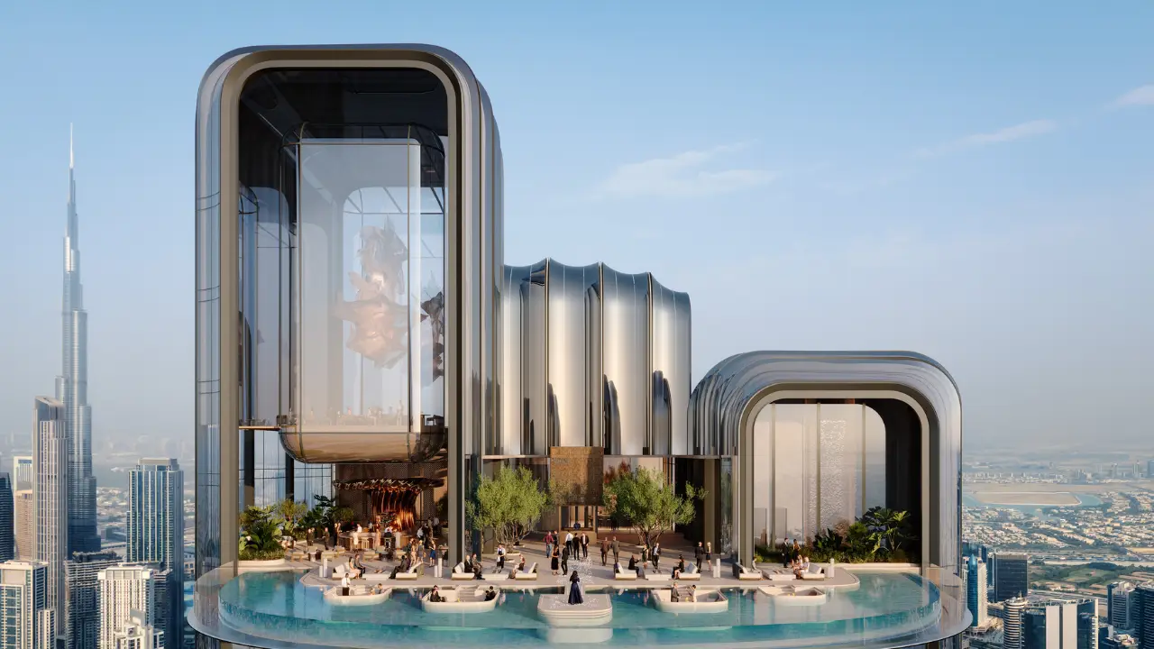 Luxury OMNIYAT tower rooftop with infinity pool and Dubai skyline during ongoing construction and development updates Presented by Tohid Fetrat