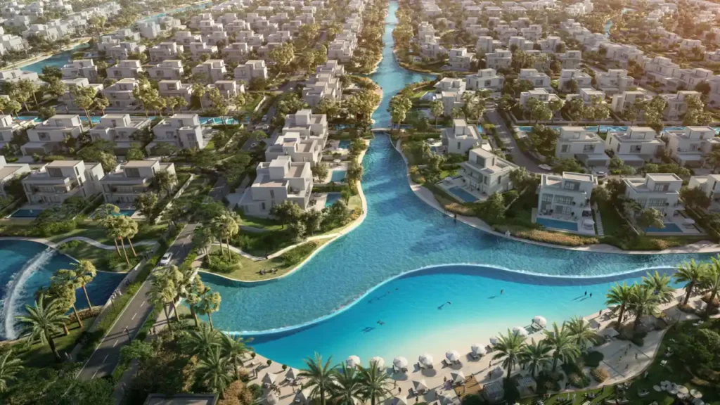 Palmiera at The Oasis Construction Updates kapsamında sahil villaları, kristal lagün, peyzaj alanları ve lüks konut topluluğunu gösteren havadan görünüm. Tohid Fetrat tarafından sunulmuştur