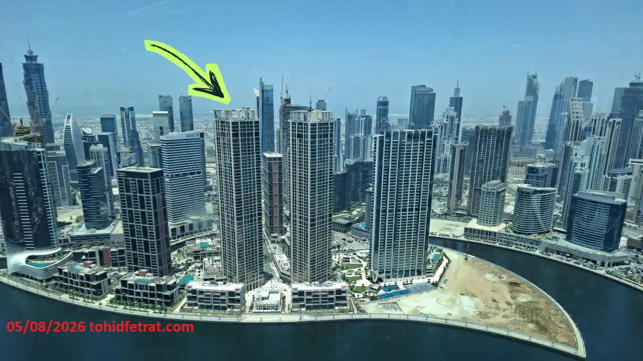 Peninsula Four The Plaza construction update April 2026 showing completed waterfront towers in Business Bay captured by Tohid Fetrat