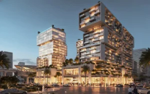 RAW District by Imtiaz in Downtown Jebel Ali contemporary mixed use exterior architecture with illuminated glass facades and luxury retail podium in Dubai - Presented by Tohid Fetrat
