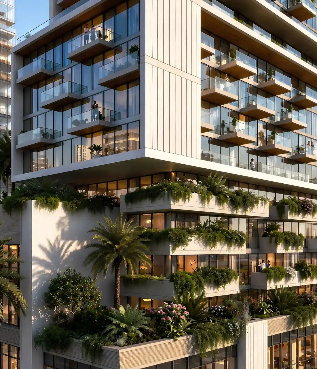 RAW District by Imtiaz in Downtown Jebel Ali luxury residential facade with glass balconies, landscaped terraces, and modern architectural detailing in Dubai - Presented by Tohid Fetrat