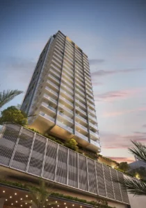 Rove Home Downtown Dubai by IRTH Development residential tower architecture with illuminated balconies at sunset in Dubai Presented by Tohid Fetrat