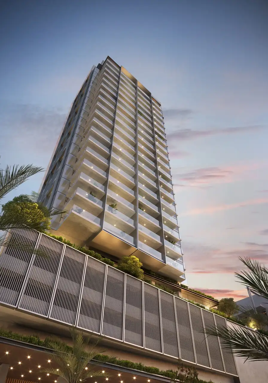 Rove Home Downtown Dubai by IRTH Development residential tower architecture with illuminated balconies at sunset in Dubai Presented by Tohid Fetrat