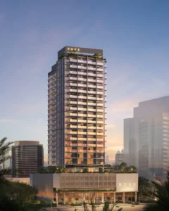 Rove Home Downtown Dubai by IRTH Development residential tower elevation with illuminated balconies and modern architecture in Dubai Presented by Tohid Fetrat