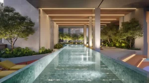 Rove Home Downtown Dubai by IRTH Development lap pool surrounded by landscaped relaxation spaces and contemporary architecture in Dubai Presented by Tohid Fetrat