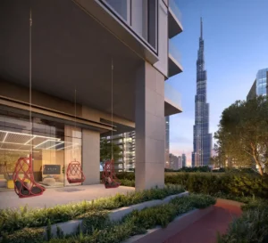 Rove Home Downtown Dubai by IRTH Development outdoor lounge area with hanging seats and Burj Khalifa views in Dubai Presented by Tohid Fetrat